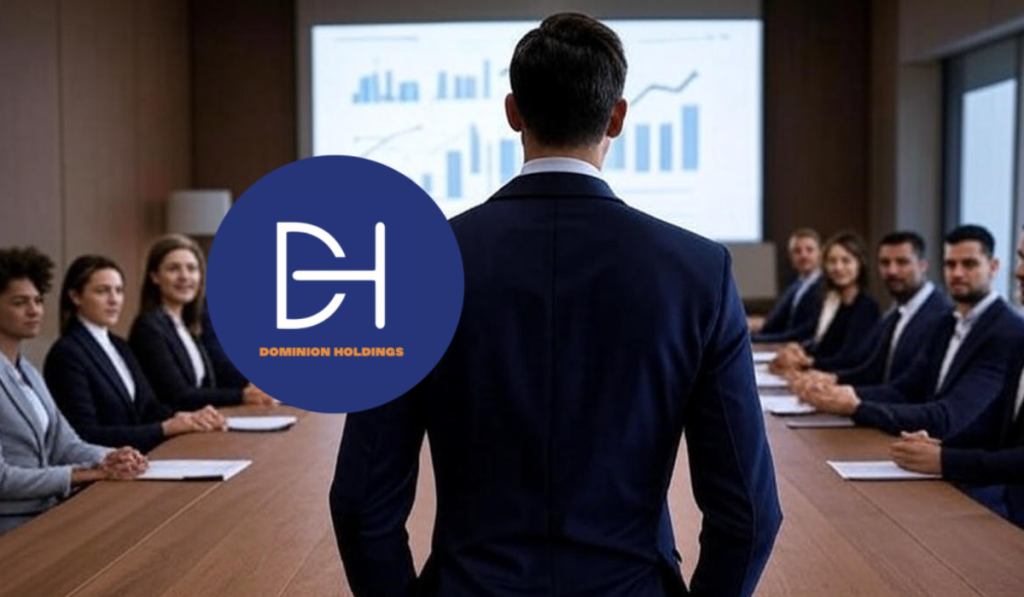view of a presenter showcasing team building services in a boardroom, with attentive attendees, digital screens, and Dominion Psych & Wellness branding, Johannesburg, South Africa.